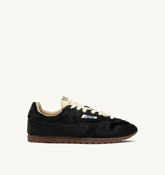 WINDSPIN SNEAKERS IN BLACK PONY HAIR EFFECT