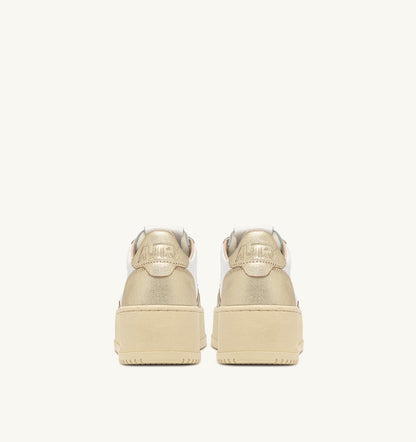 MEDALIST PLATFORM SNEAKERS IN WHITE AND METALIZED PLATINUM LEATHER