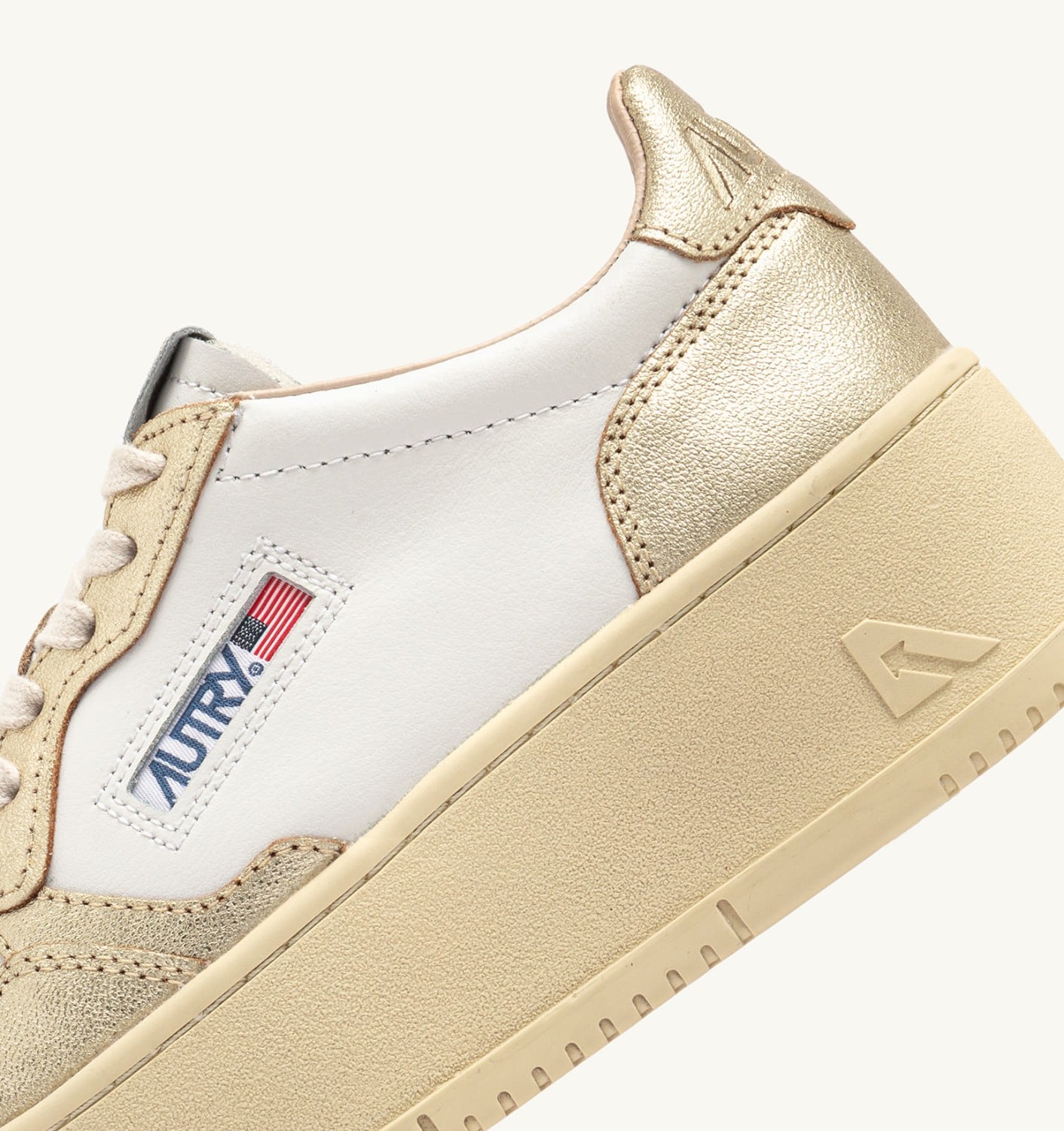 MEDALIST PLATFORM SNEAKERS IN WHITE AND METALIZED PLATINUM LEATHER